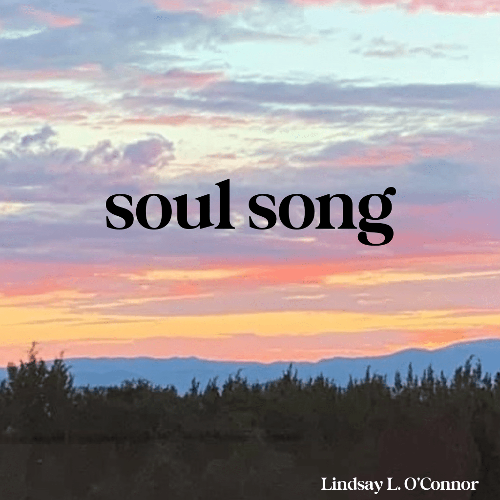 A beautiful Santa Fe sunset with trees and mountains silhouetted at the bottom of the image. Text over the image reads “soul song”